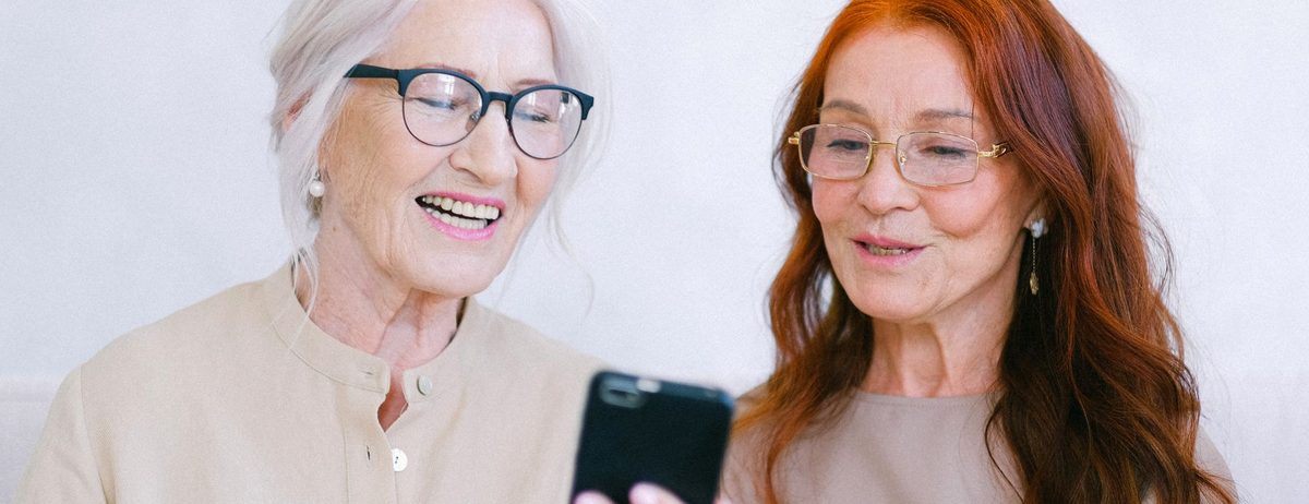 A patient booking an appointment on her phone at home.
