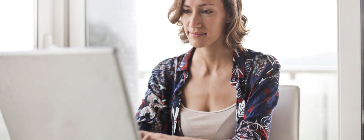 A billing team member working at a desk in the front office.